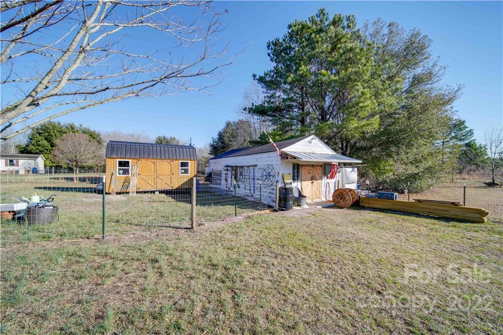 1540 Campbell Road Jefferson, SC 29718 - Photo 32 of 40 a house with trees in the background