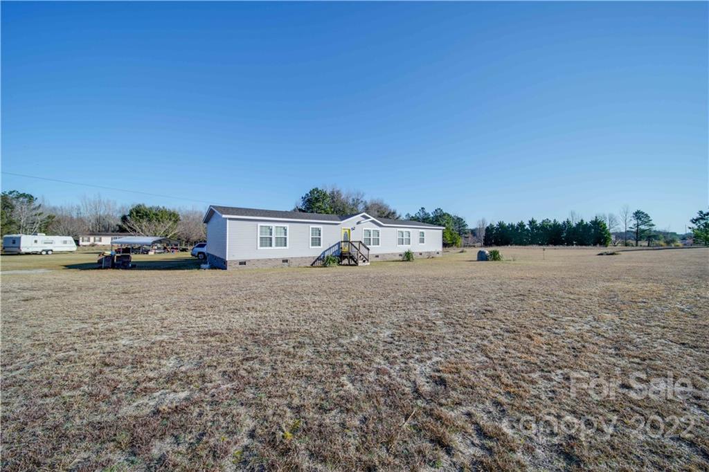 1540 Campbell Road Jefferson, SC 29718 - Photo 33 of 40 a view of multiple houses with a yard