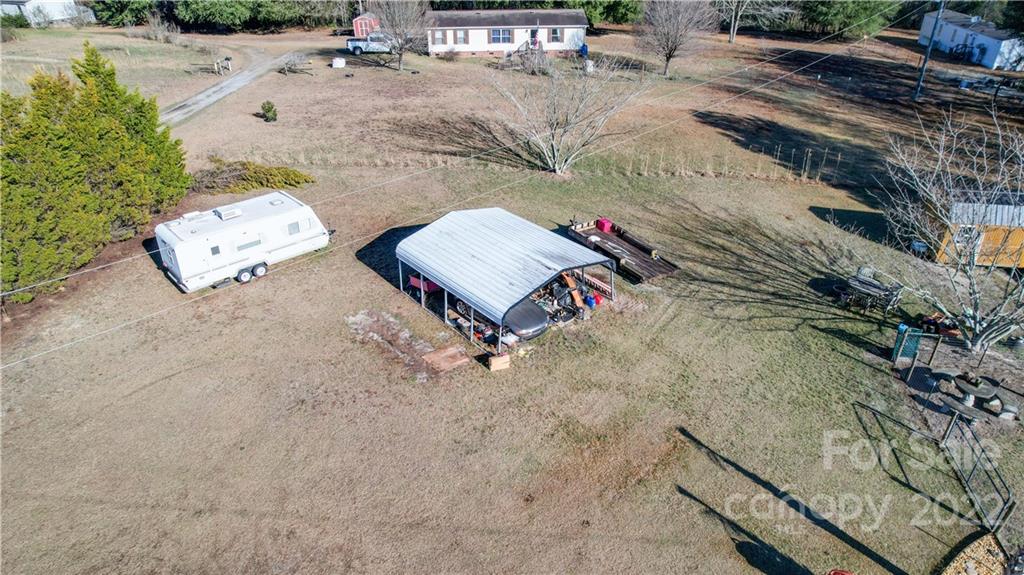 1540 Campbell Road Jefferson, SC 29718 - Photo 38 of 40 an aerial view of a house with a yard and sitting area