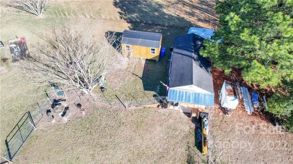 1540 Campbell Road Jefferson, SC 29718 - Photo 39 of 40 a backyard of a house with lots of green space