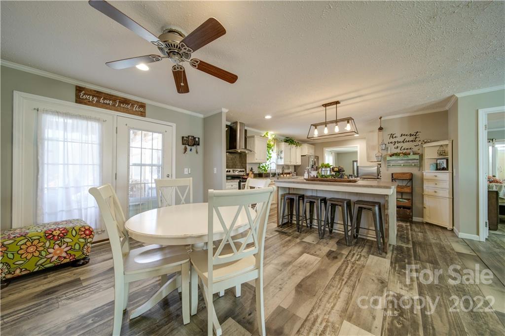 1540 Campbell Road Jefferson, SC 29718 - Photo 6 of 40 a dining room with furniture and window