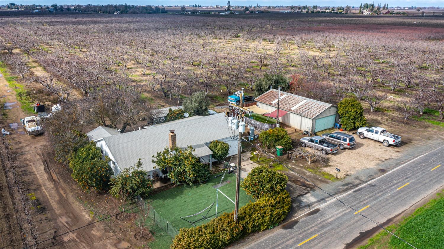 15271 Moore Road Lodi, CA 95242 - Photo 1 of 1 an aerial view of house with yard and lake view