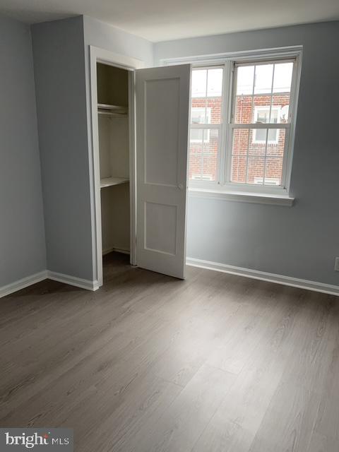 631 Anchor Street Philadelphia, PA 19120 - Photo 18 of 18 an empty room with windows and closet