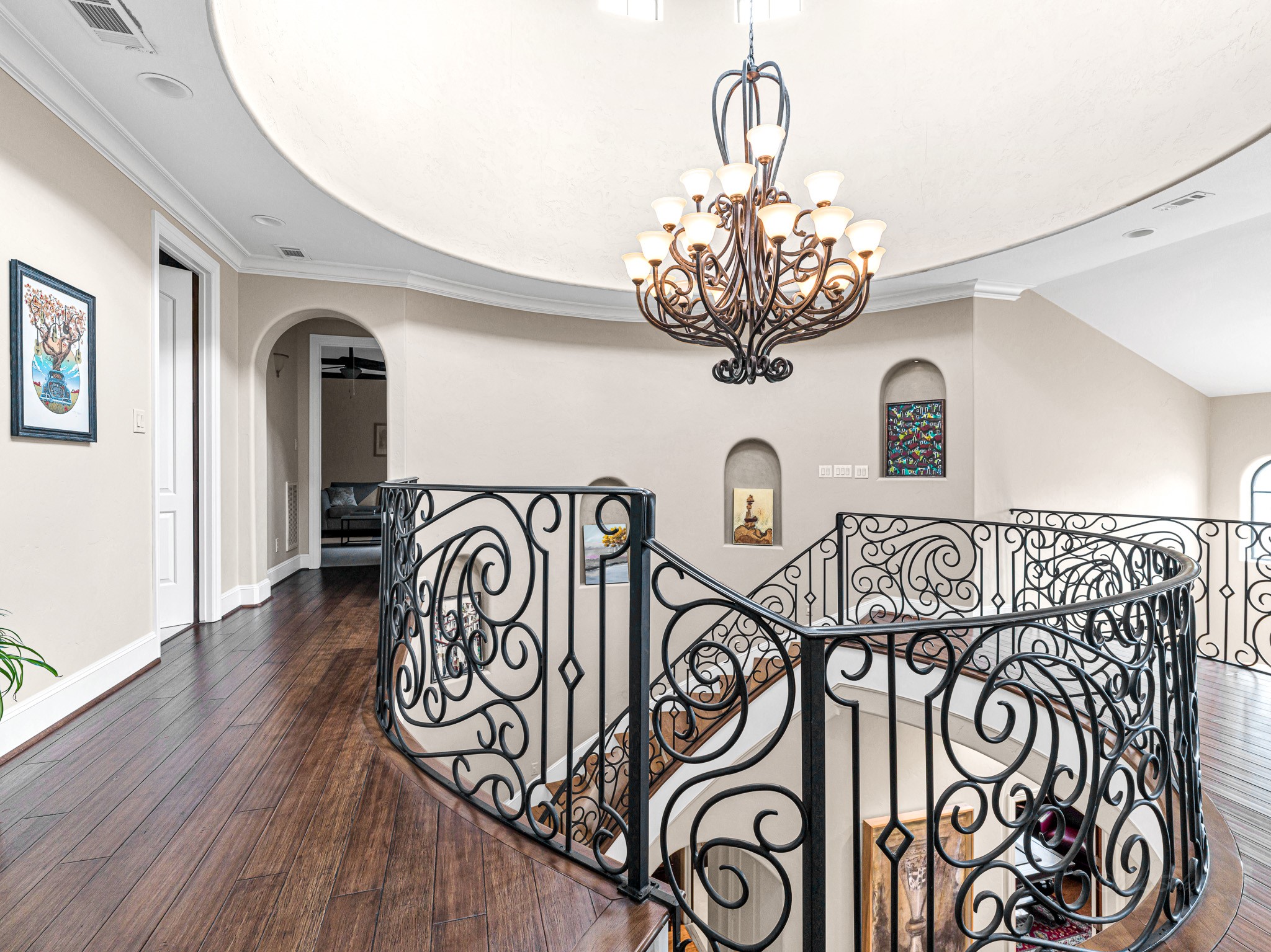 4614 Inker Street Houston, TX 77007 - Photo 25 of 36 View of the hallway stairs and chandelier from second floor.