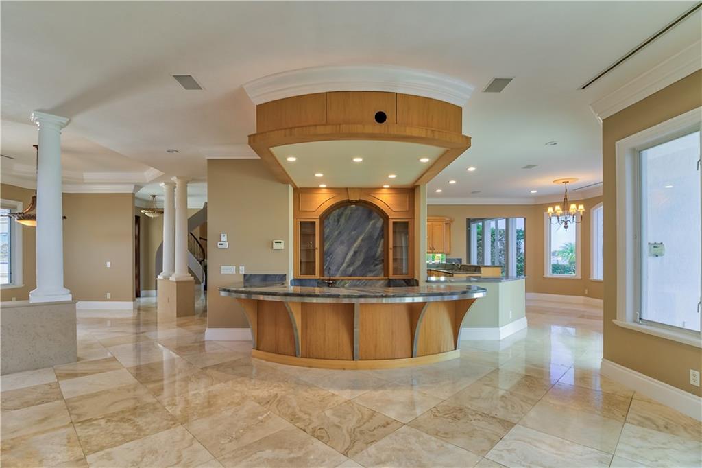 18 Island Road Stuart, FL 34996 - Photo 27 of 58 Bar is Central to the Casual Spaces and You Can Look Right to the Waterway!