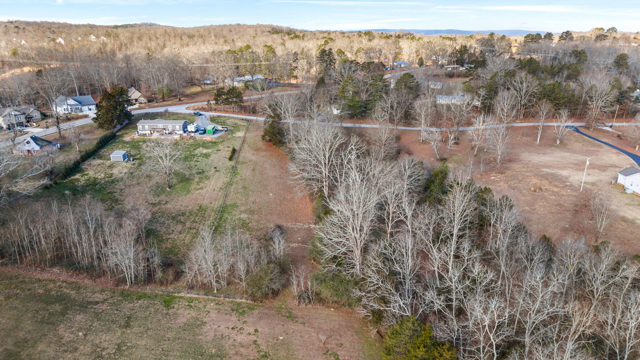 12108 Bettis Road Georgetown, TN 37336 - Photo 16 of 22 a view of a town with mountains in the background