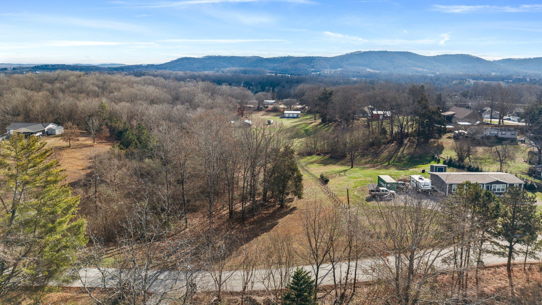 12108 Bettis Road Georgetown, TN 37336 - Photo 19 of 22 a view of a lot of trees and houses