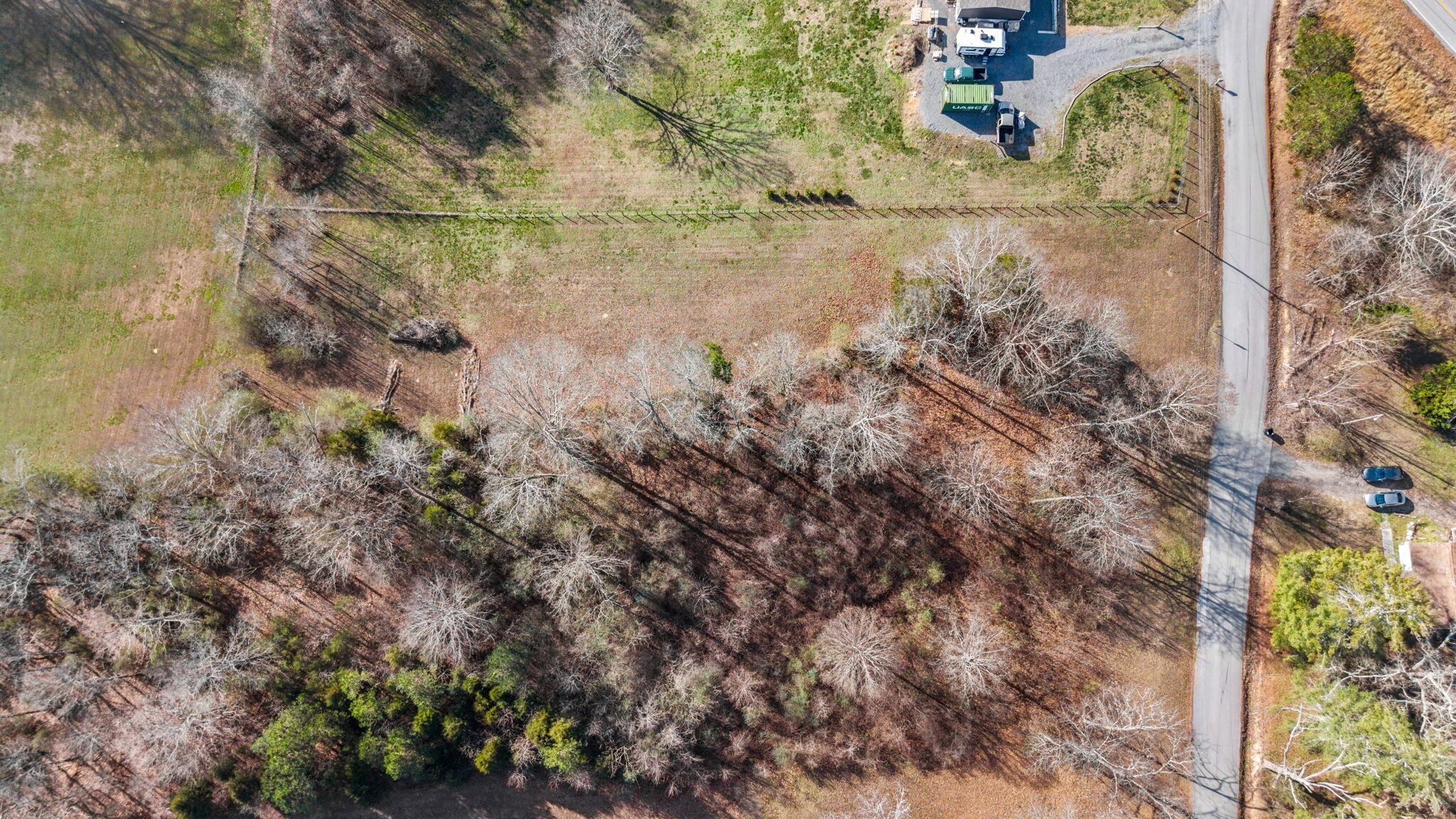 12108 Bettis Road Georgetown, TN 37336 - Photo 4 of 22 a backyard of a house with lots of green space
