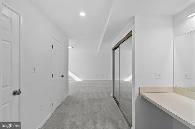 a view of hallway with shower