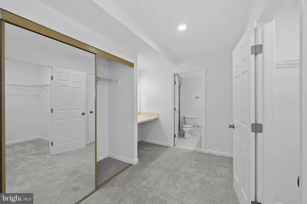 a view of an empty walk in closet