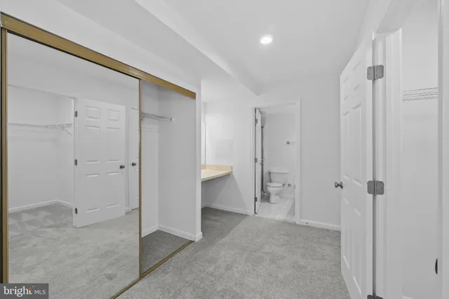 a view of an empty walk in closet