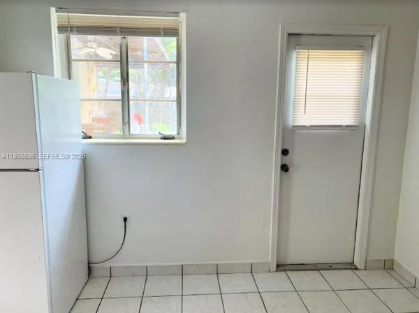 a view of an empty room with window