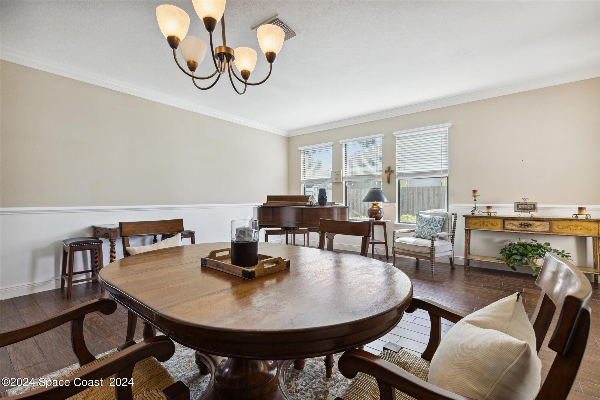 110 Poinsetta Street Indialantic, FL 32903 - Photo 15 of 67 a view of a dining room with furniture