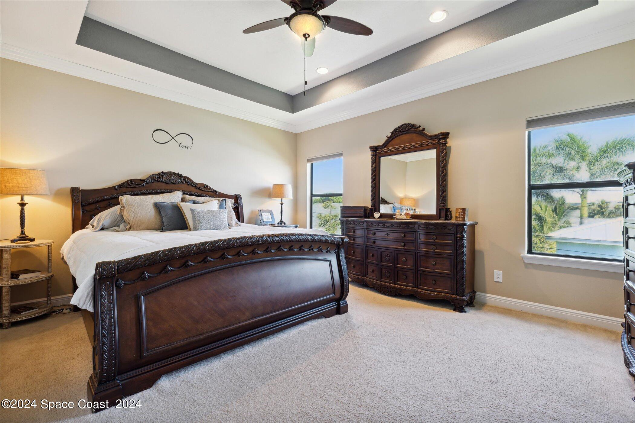 110 Poinsetta Street Indialantic, FL 32903 - Photo 30 of 67 a bedroom with a bed dresser and a window