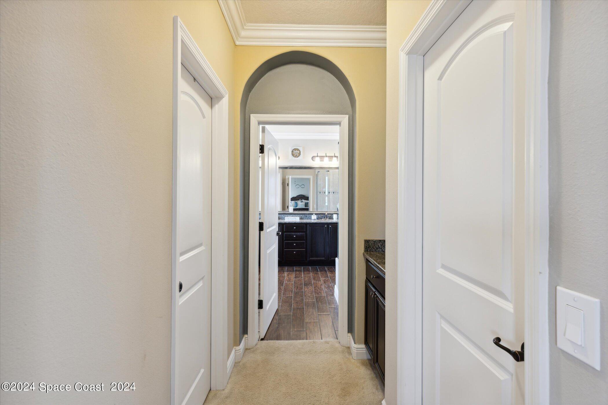 110 Poinsetta Street Indialantic, FL 32903 - Photo 31 of 67 a view of a livingroom from a hallway