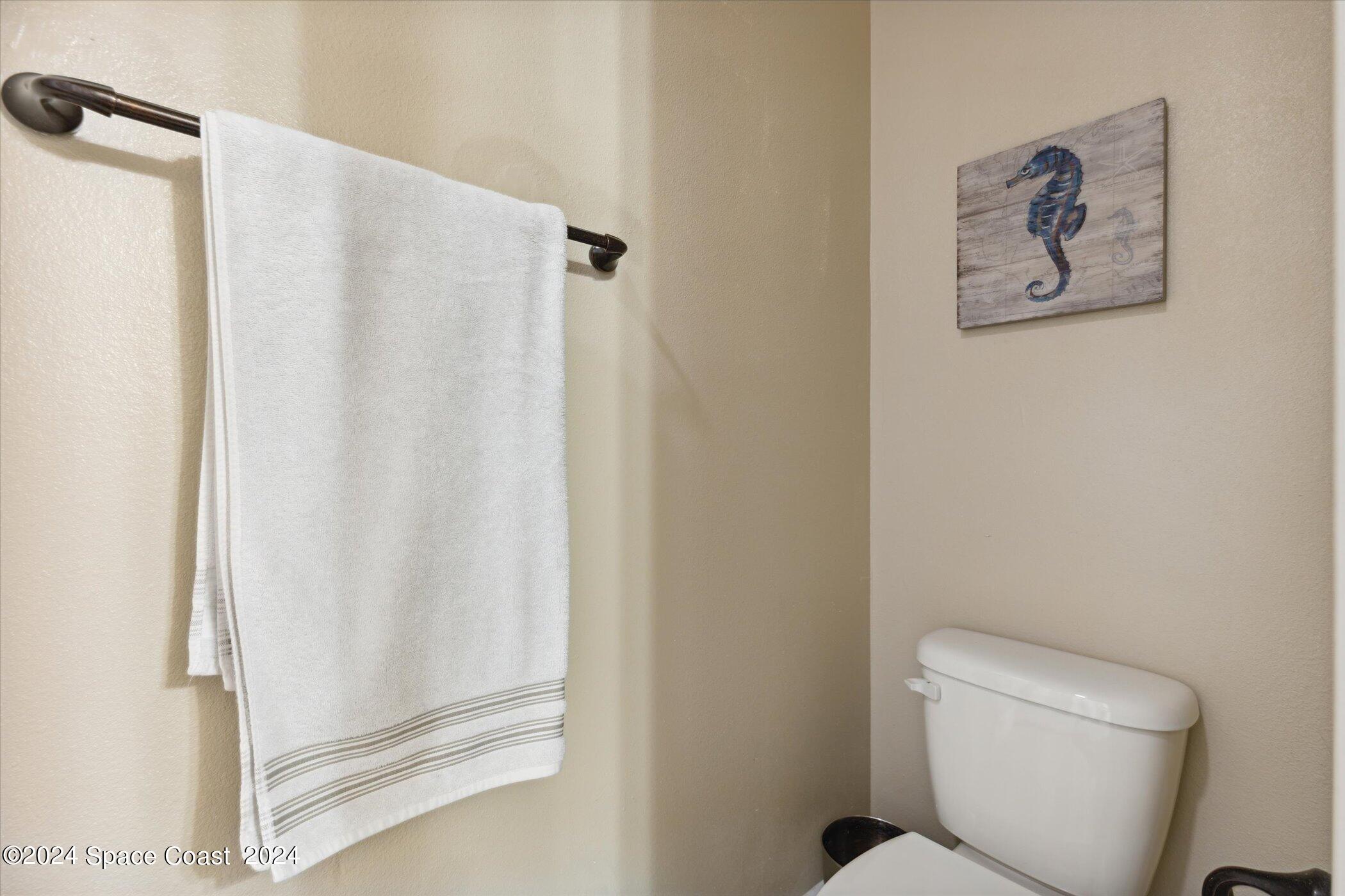 110 Poinsetta Street Indialantic, FL 32903 - Photo 41 of 67 a bathroom with a shower and a toilet