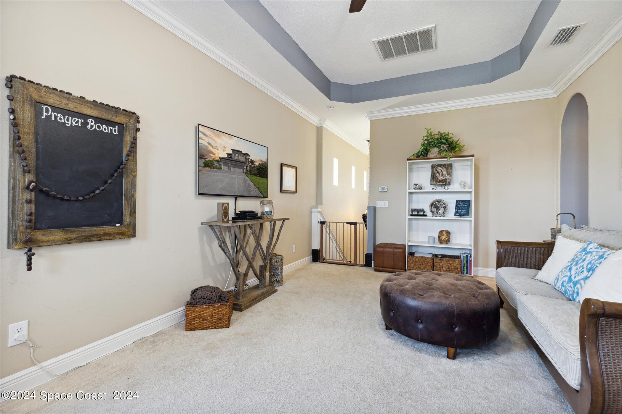 110 Poinsetta Street Indialantic, FL 32903 - Photo 47 of 67 a bedroom with furniture and a painting