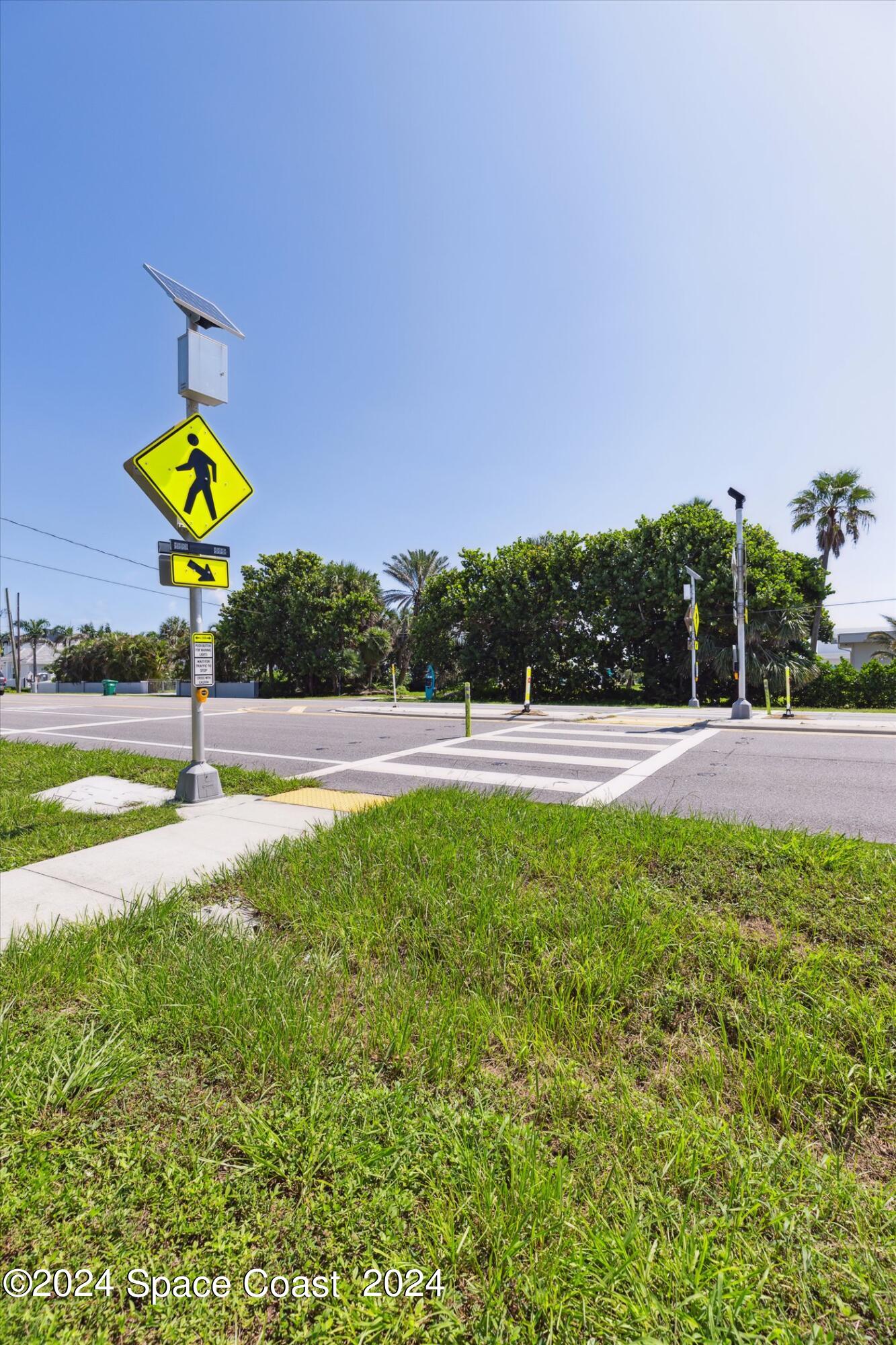 110 Poinsetta Street Indialantic, FL 32903 - Photo 61 of 67 a view of a swimming pool with a yard