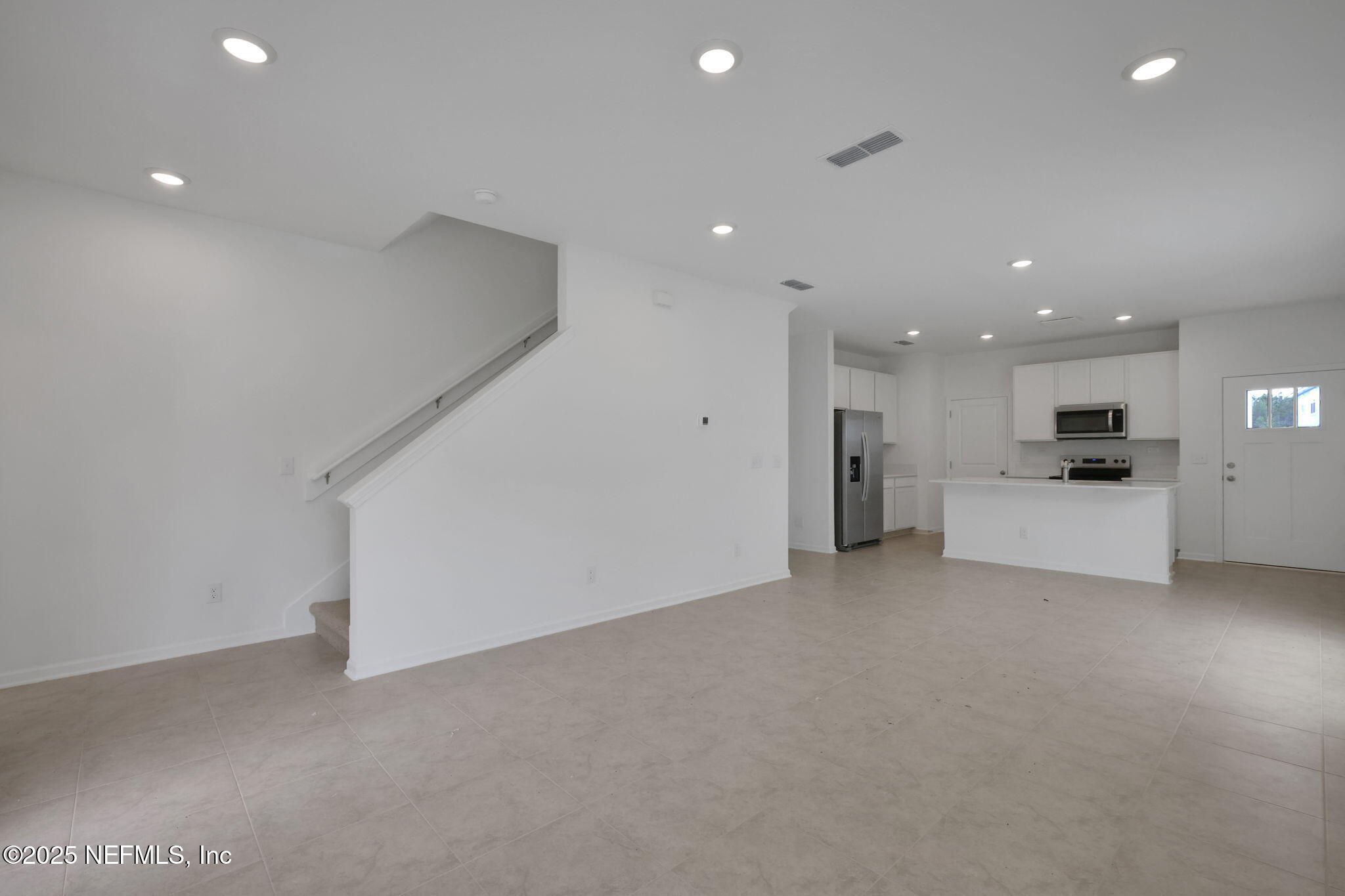3829 Athenian Way Middleburg, FL 32068 - Photo 11 of 48 a view of a kitchen with a sink and a stove top oven