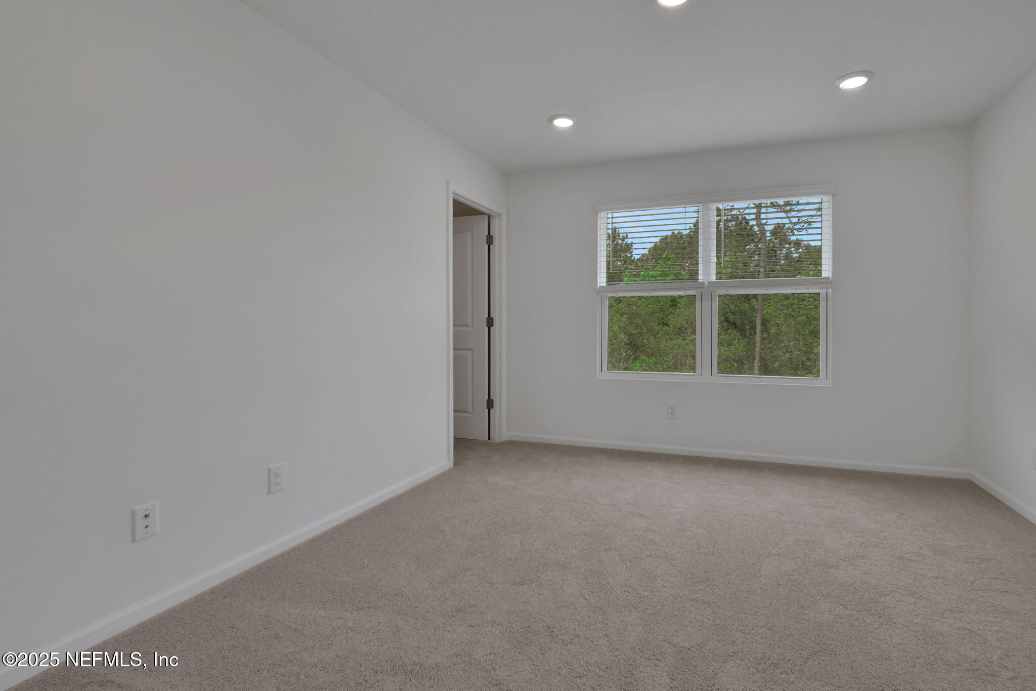 3829 Athenian Way Middleburg, FL 32068 - Photo 19 of 48 an empty room with windows