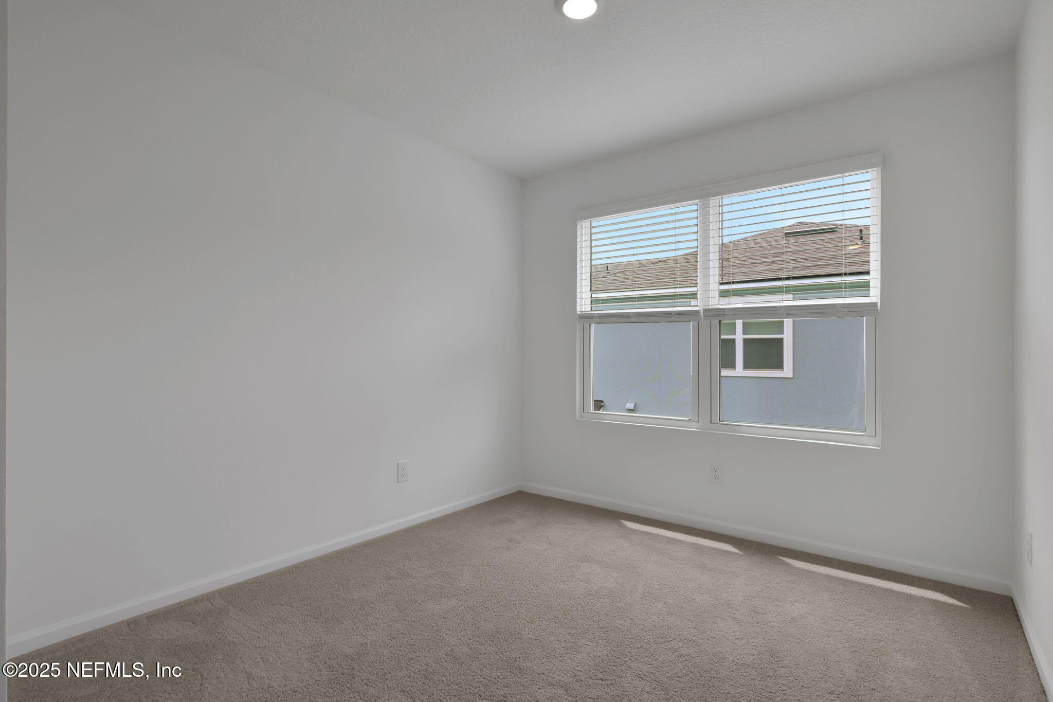 3829 Athenian Way Middleburg, FL 32068 - Photo 21 of 48 a view of an empty room with a window