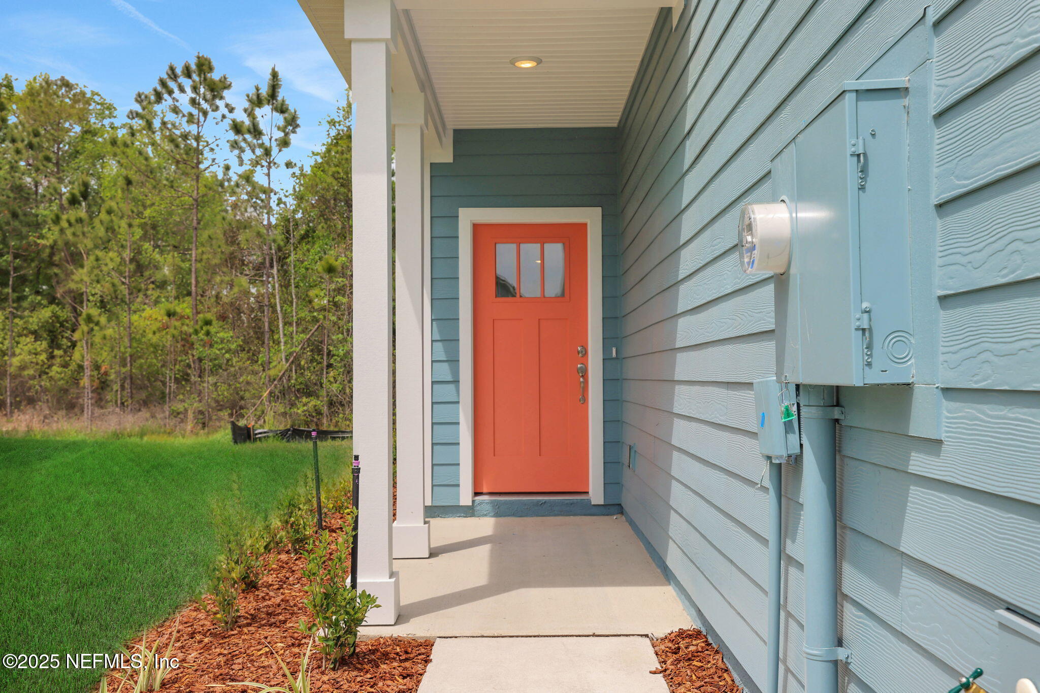 3829 Athenian Way Middleburg, FL 32068 - Photo 3 of 48 a view of a pathway of a building with a yard