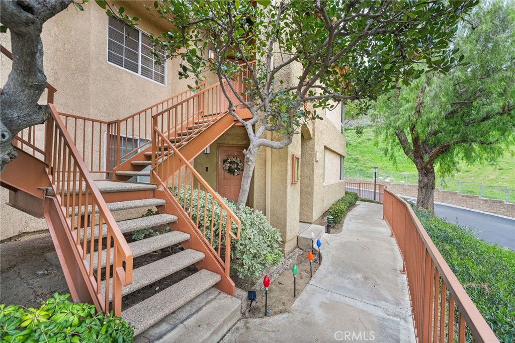 5470 Copper Canyon Road, Unit 2E Yorba Linda, CA 92887 - Photo 16 of 25 a view of a house with backyard and deck