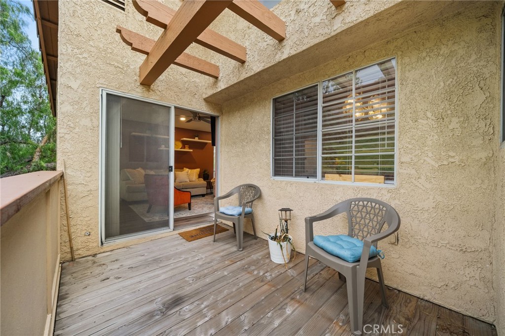 5470 Copper Canyon Road, Unit 2E Yorba Linda, CA 92887 - Photo 5 of 25 a balcony view with a dishwasher and a window