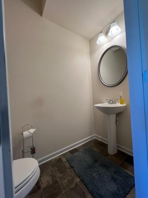 20 Pippin Place Northeast Rome, GA 30165 - Photo 9 of 25 Half bath with baseboards and toilet