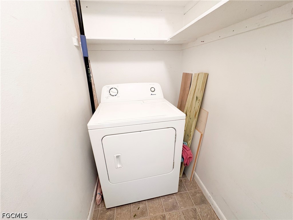 1830 Brantley Road, Unit I7 Fort Myers, FL 33907 - Photo 30 of 34 a utility room with dryer and washer
