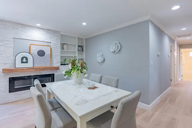 a view of a table and chairs in a room