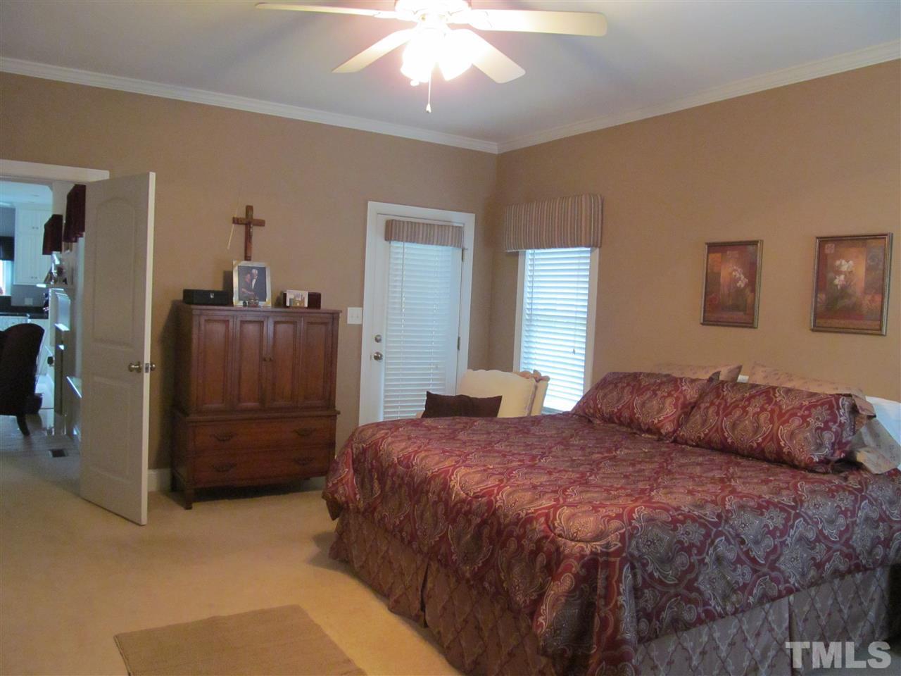 3540 Saddle Ridge Road Stem, NC 27581 - Photo 12 of 25 a bedroom with a bed and a walk in closet