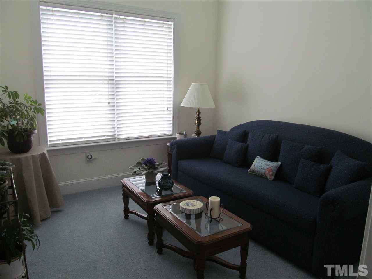 3540 Saddle Ridge Road Stem, NC 27581 - Photo 17 of 25 a living room with furniture and a window
