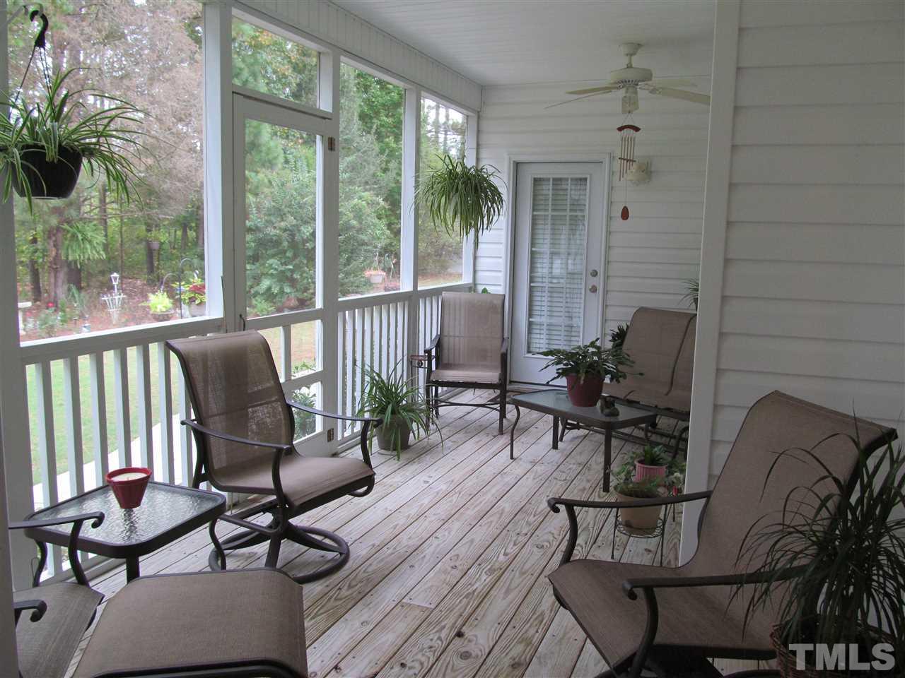 3540 Saddle Ridge Road Stem, NC 27581 - Photo 21 of 25 a living room with furniture and a window