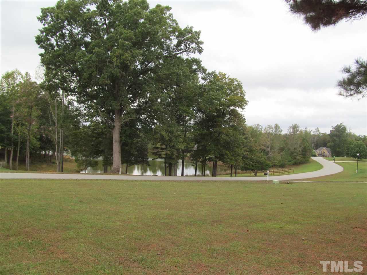 3540 Saddle Ridge Road Stem, NC 27581 - Photo 25 of 25 a view of swimming pool with a yard and trees