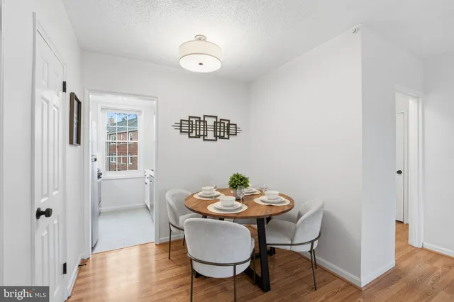 a kitchen with a sink a stove and a refrigerator