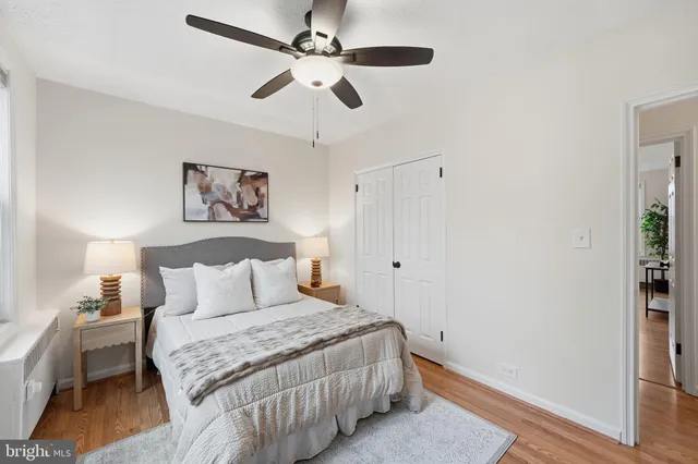 a bedroom with furniture and a window