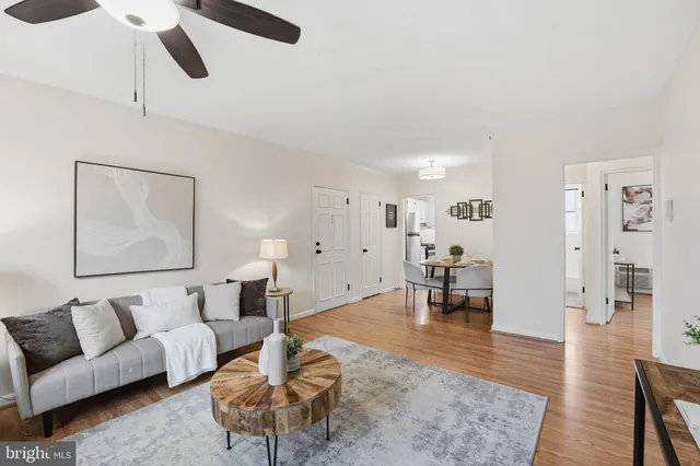 a view of a livingroom with furniture and a table