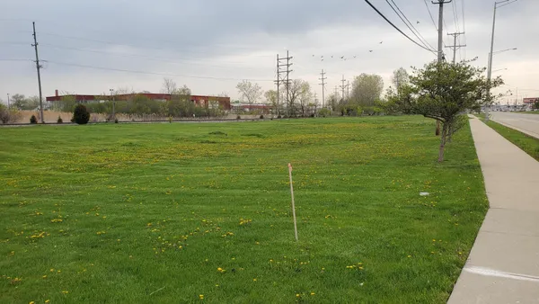 a view of a play ground in front of a house