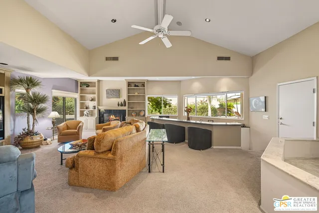 a spacious bathroom with a sink mirror and vanity