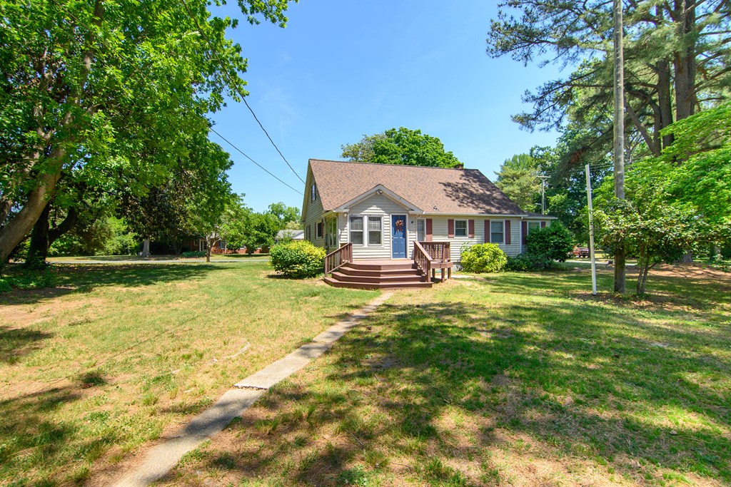 24432 Maxwell Street Parksley, VA 23421 - Photo 30 of 39 a view of house with a garden