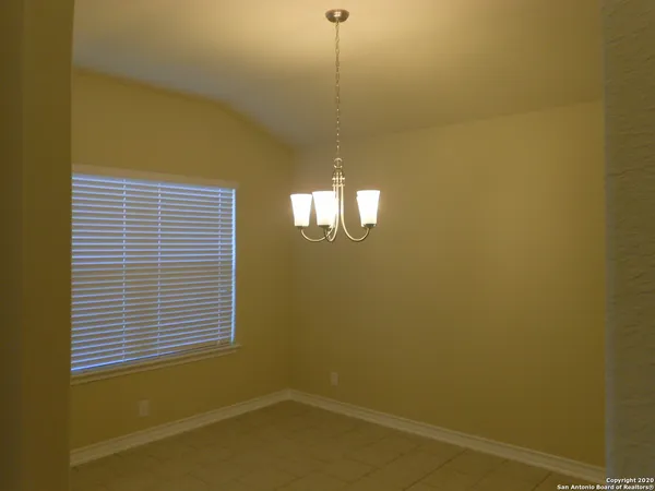 a view of a room with a window