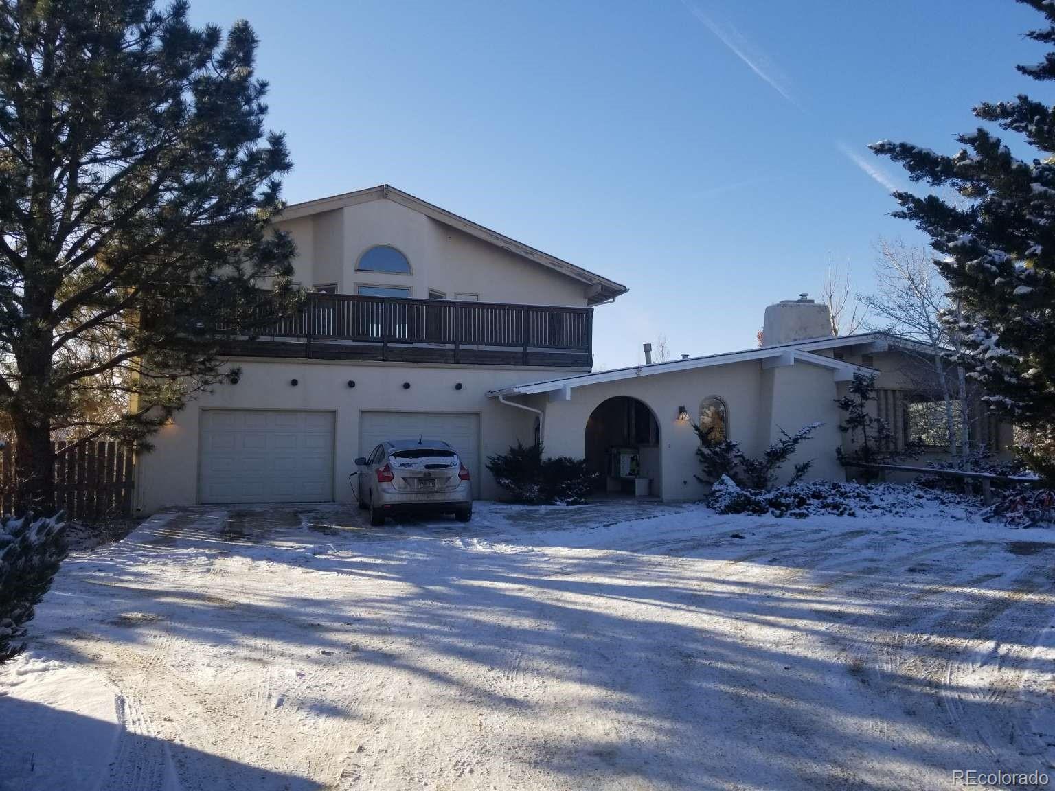 3800 Plateau Road Longmont, CO 80503 - Photo 1 of 12 a view of a house with a yard