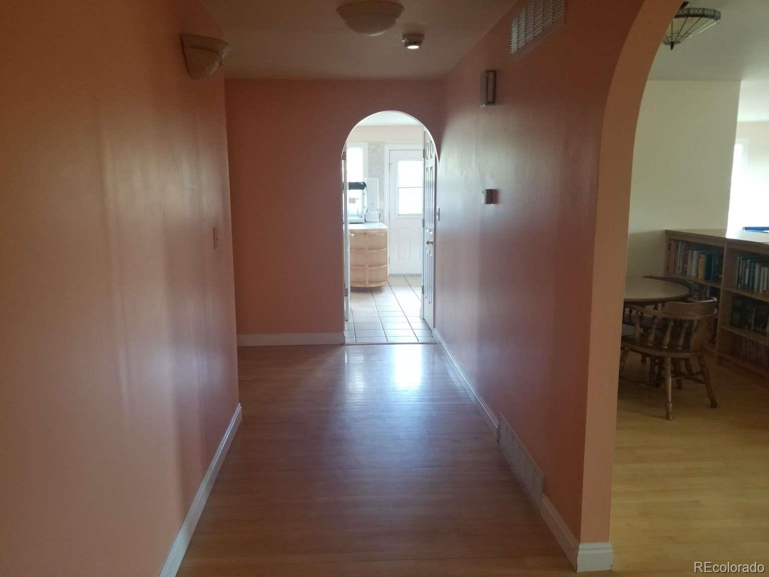 3800 Plateau Road Longmont, CO 80503 - Photo 6 of 12 a view of gallery with wooden floor