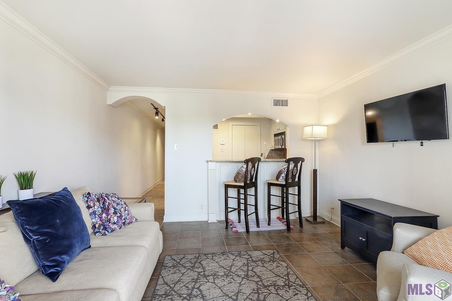 2045 North 3rd Street, Unit 309 Baton Rouge, LA 70802 - Photo 6 of 19 Living Room Facing Kitchen
