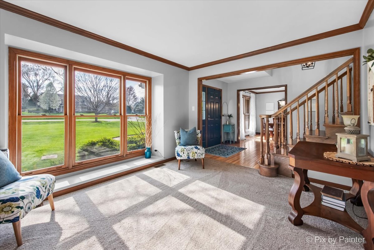 3910 Tecoma Drive Crystal Lake, IL 60012 - Photo 12 of 54 a view of a livingroom with furniture and a large window