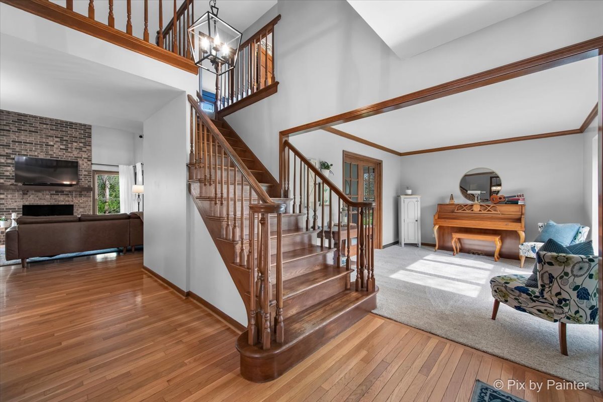3910 Tecoma Drive Crystal Lake, IL 60012 - Photo 14 of 54 a view of entryway livingroom and hall with wooden floor