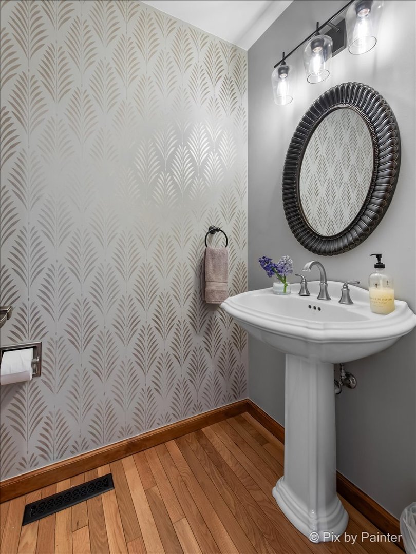 3910 Tecoma Drive Crystal Lake, IL 60012 - Photo 29 of 54 a bathroom with a sink and a mirror