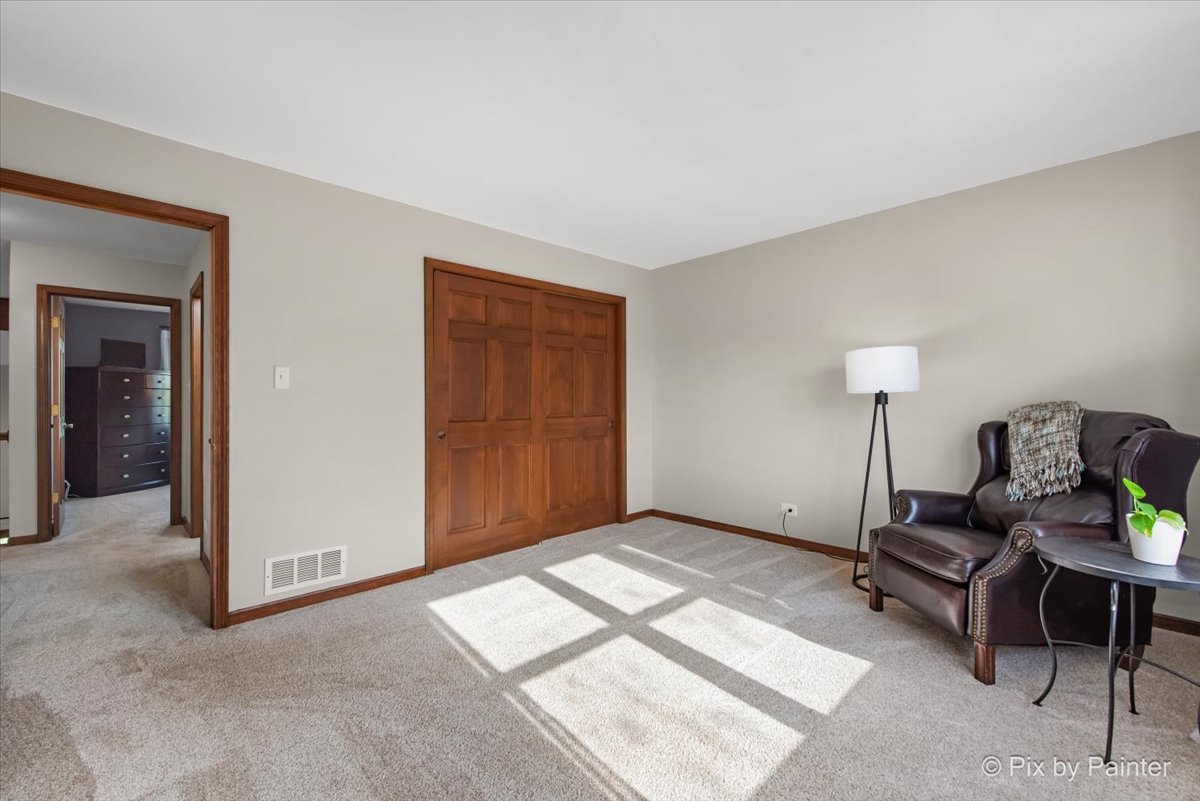 3910 Tecoma Drive Crystal Lake, IL 60012 - Photo 43 of 54 a bedroom with furniture and a window