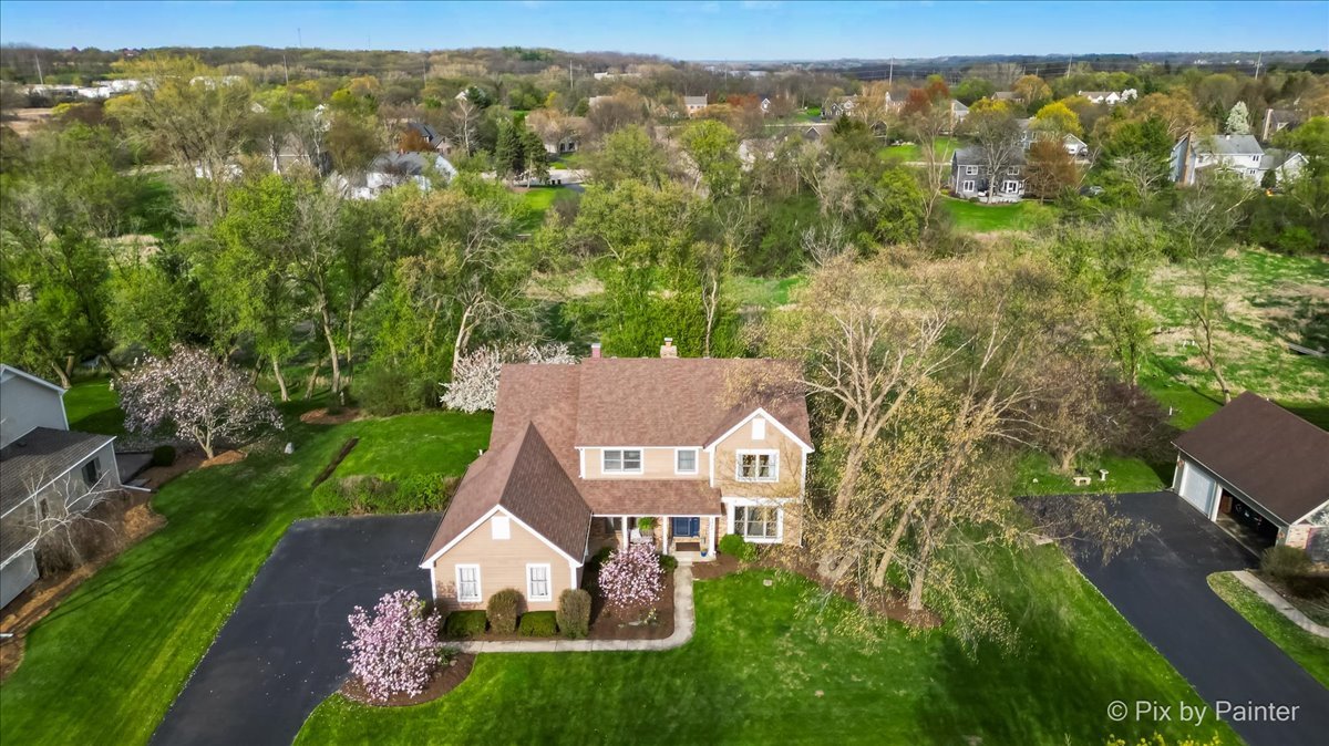 3910 Tecoma Drive Crystal Lake, IL 60012 - Photo 44 of 54 an aerial view of residential houses with outdoor space and trees